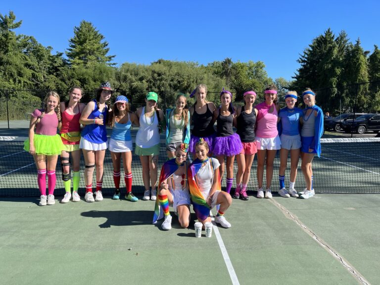 (PHOTO: Earlier this season the Rye Girls Varsity Tennis team dressed in fun costumes for an in house tournament to work on doubles play.)