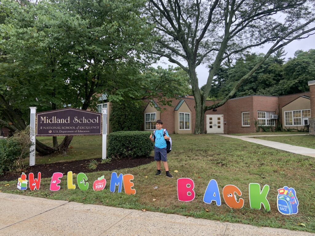 (PHOTO: Midland 5th Grader Luke Meyers says Welcome Back!)