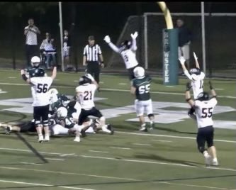 (PHOTO: AJ Miller on a QB sneak for a touchdown late in the 4th quarter for Rye to take the lead.)