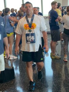 (PHOTO: Chris Letizia after completing the tower run at One World Observatory.)