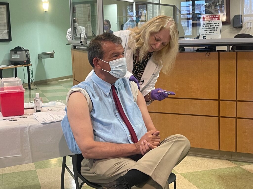 (PHOTO: Rye Guy and County Boss George Latimer got flu shot and COVID booster on Tuesday October 4, 2022.)