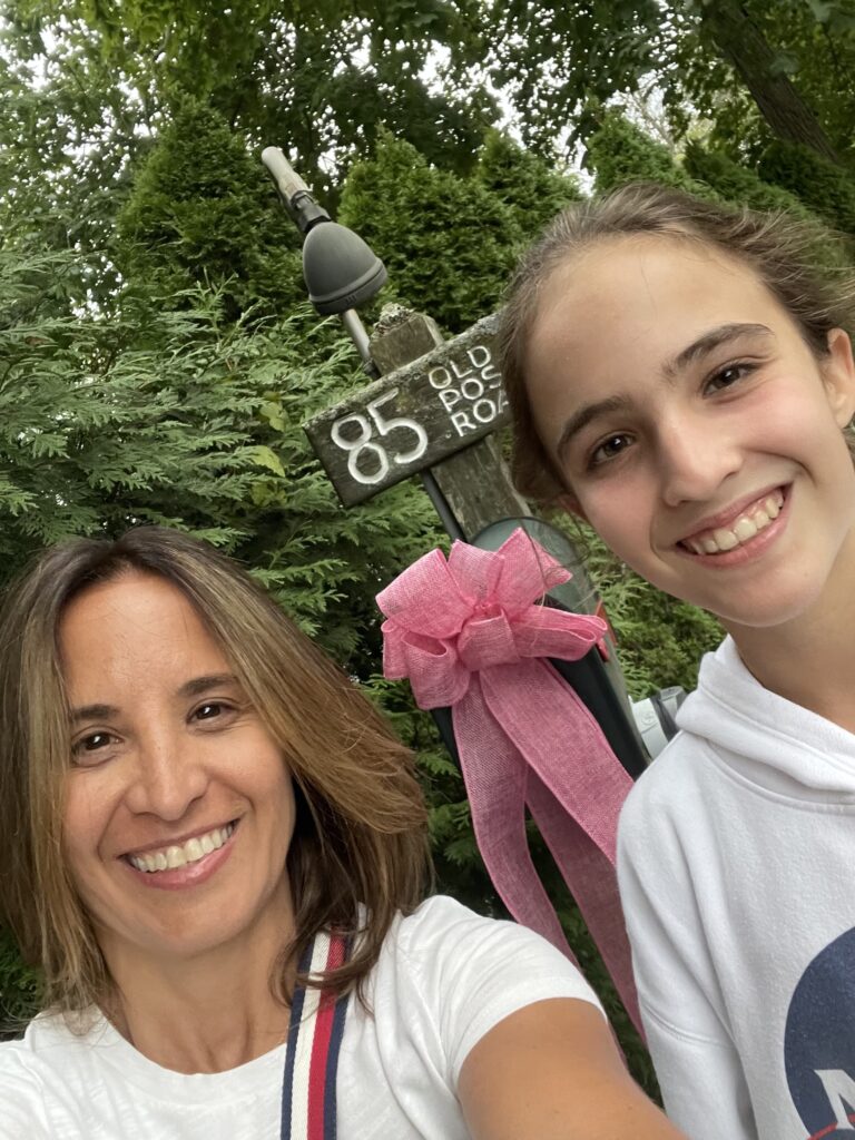 (PHOTO: Laura Centeno and her daughter, Martina Farres, make a great mom & daughter pink tying duo! Photo credit: Laura Centeno.)