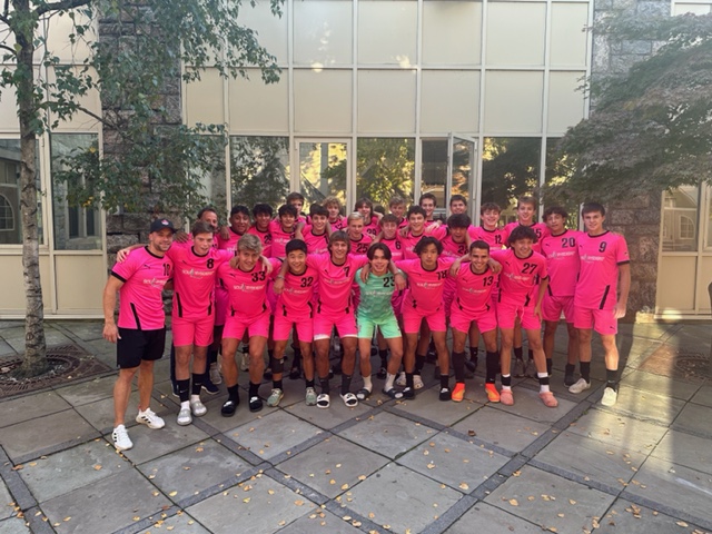 (PHOTO: The Rye Boys Varsity Soccer team pre-match photo sporting their pink "Soul Ryeders" kit.)