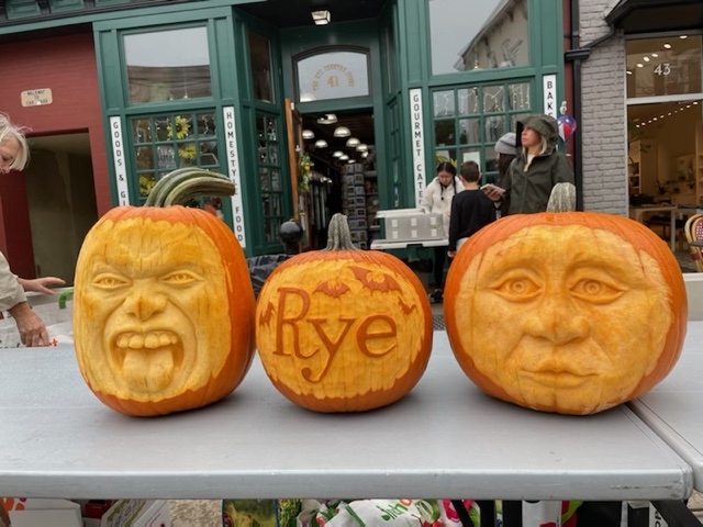 (PHOTO: Just a few of the freshly-carved pumpkins on display at the annual Window Paining event.)