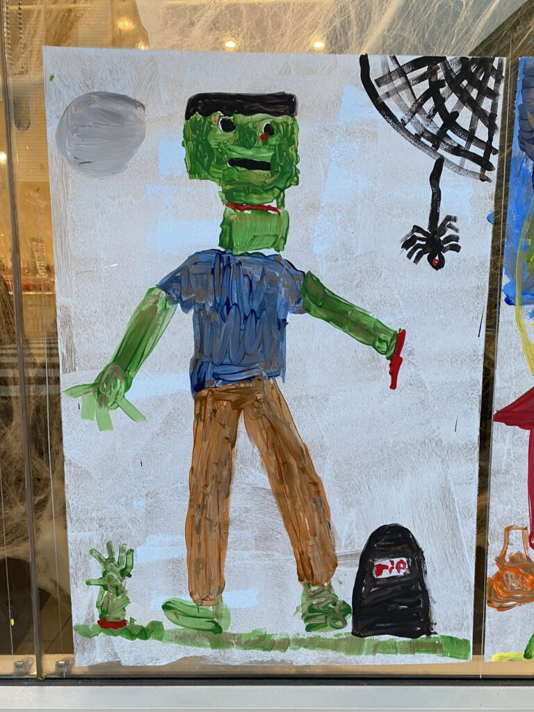 (PHOTO: Artwork from the The 69th Annual Halloween Window Painting on Purchase Street, 2022.)