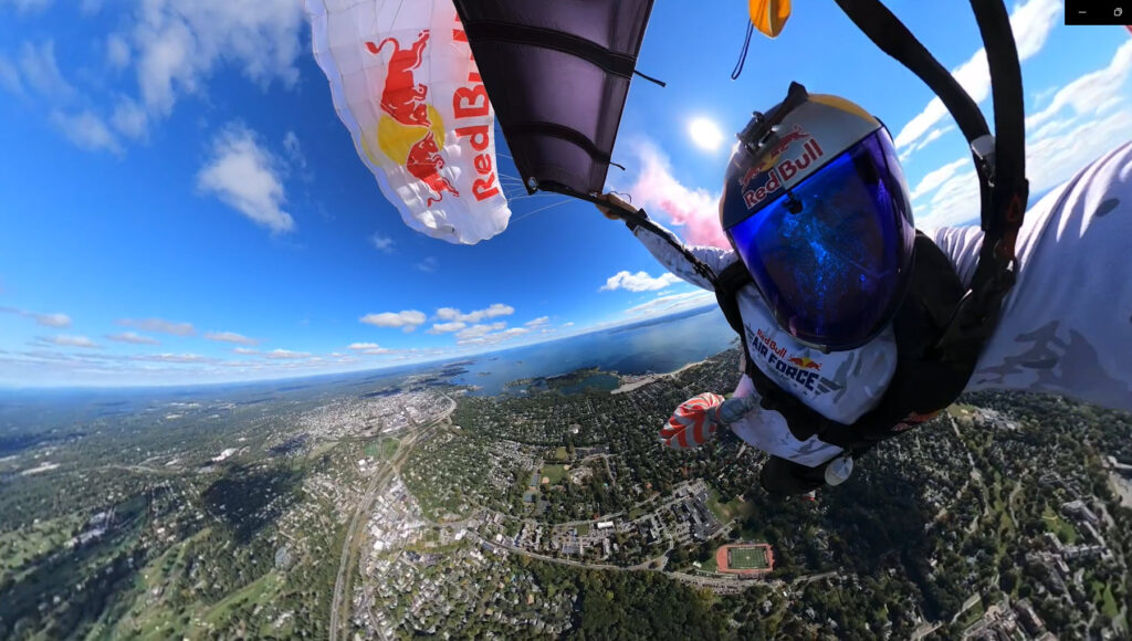 (PHOTO: Beautiful day to skydive into the Rye Harrison football game.)