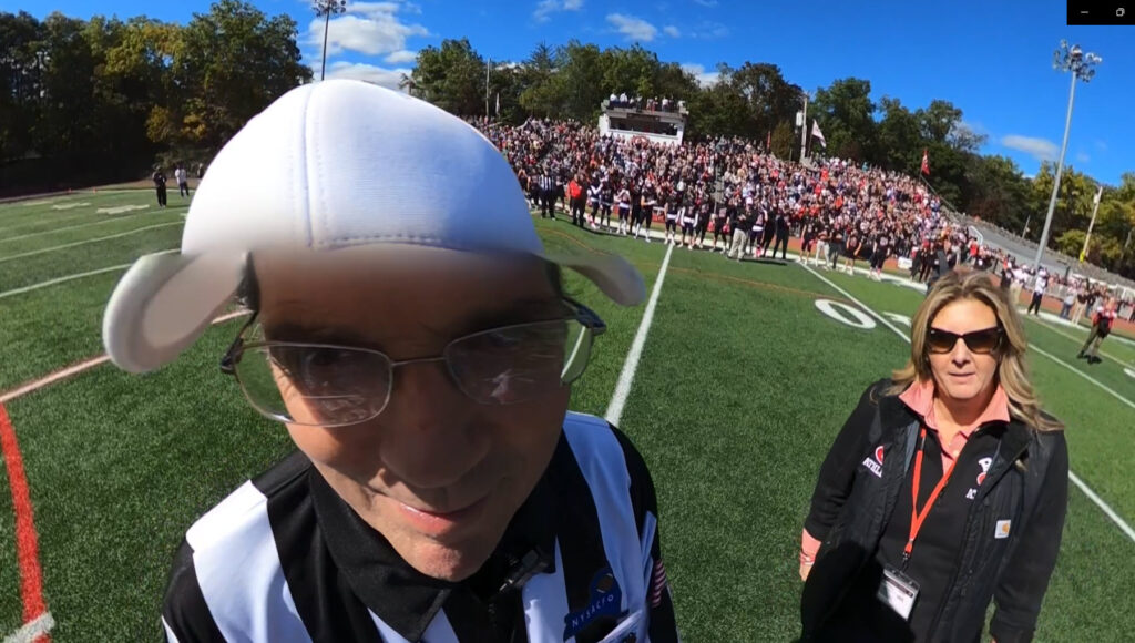 (PHOTO: Greeting the referee and Rye Athletic Director Susan Reid Dullea.)