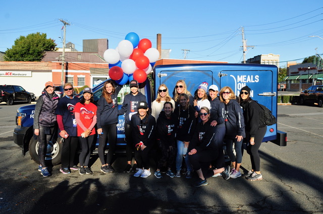 (PHOTO: The Meals On Main Street (MOMS, fka Caritas) Auxiliary Board at the 2021 Run. From left to right, second row: Joanna Roberson (Rye), Lisa Hogan (Rye), Michele Allison (Rye), Meghan Charles (Harrison), Jennifer Molloy (Rye), Nicole Gibbs (Rye), Cameron Scansaroli (Rye), Erika Lee (Rye), Jennifer Swanson (Rye), Nancy Tirone (White Plains), and Tara Castellano (Rye Neck). From left to right, first row: Jennifer Passaretti (Rye), Debbie Bahl (Rye), and Lisa King (Rye).)