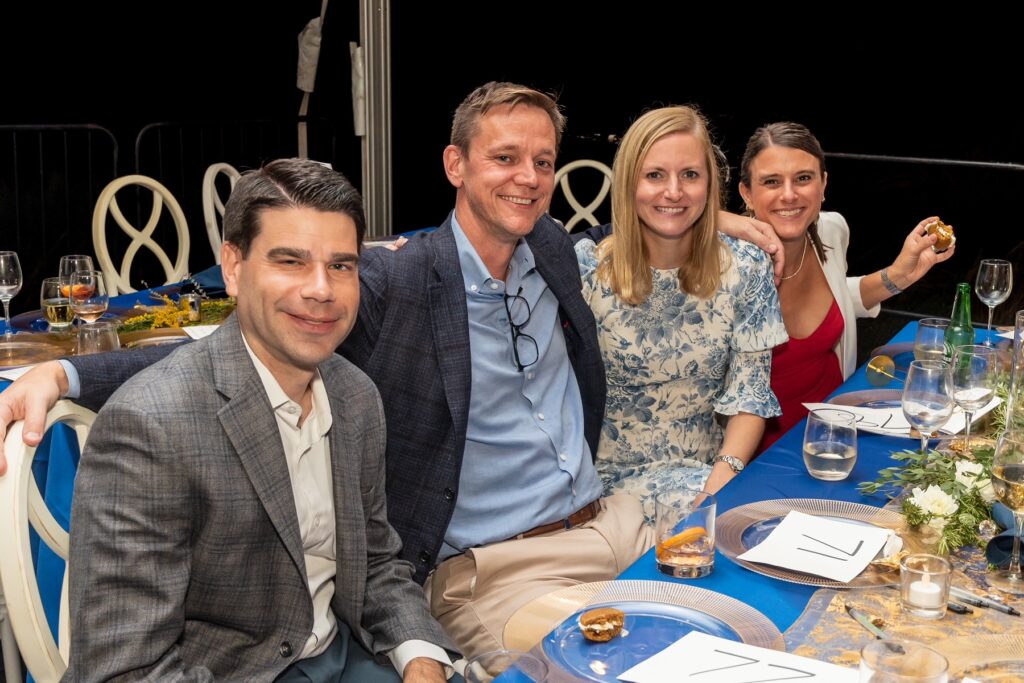 (PHOTO: Adam Weinberger, Andrew and Malwina Johnston and Emily Weinberger enjoying the Jay Heritage Center’s 30th Anniversary Moonlight Soirée on September 17, 2022.)