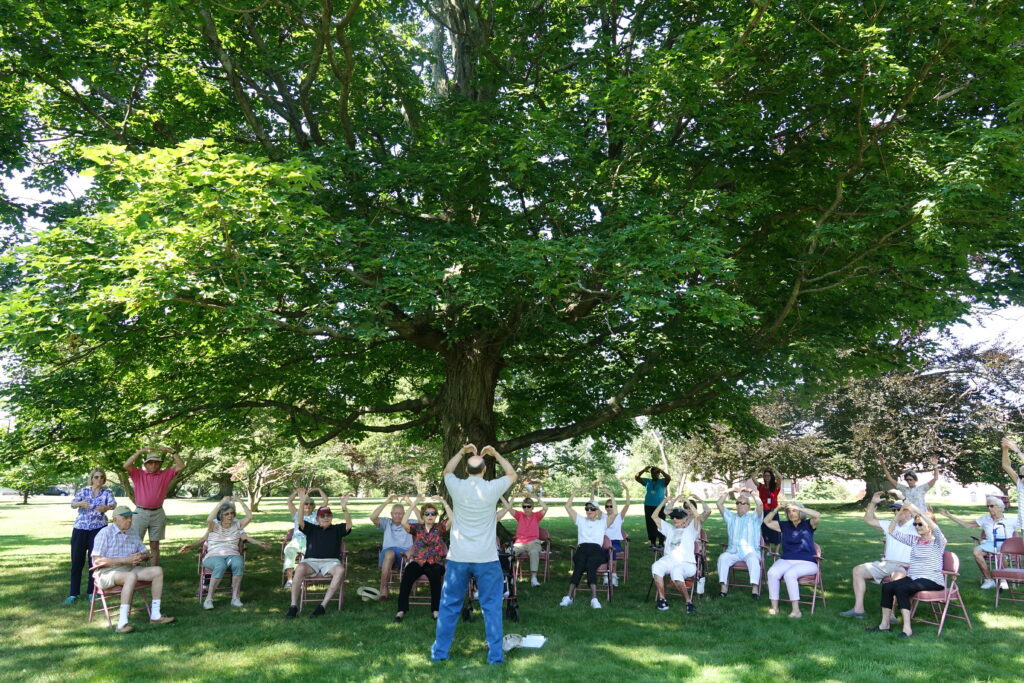 (PHOTO: Osborn residents practice Qigong, part of traditional Chinese medicine that involves using exercises to optimize energy within the body, mind, and spirit.)