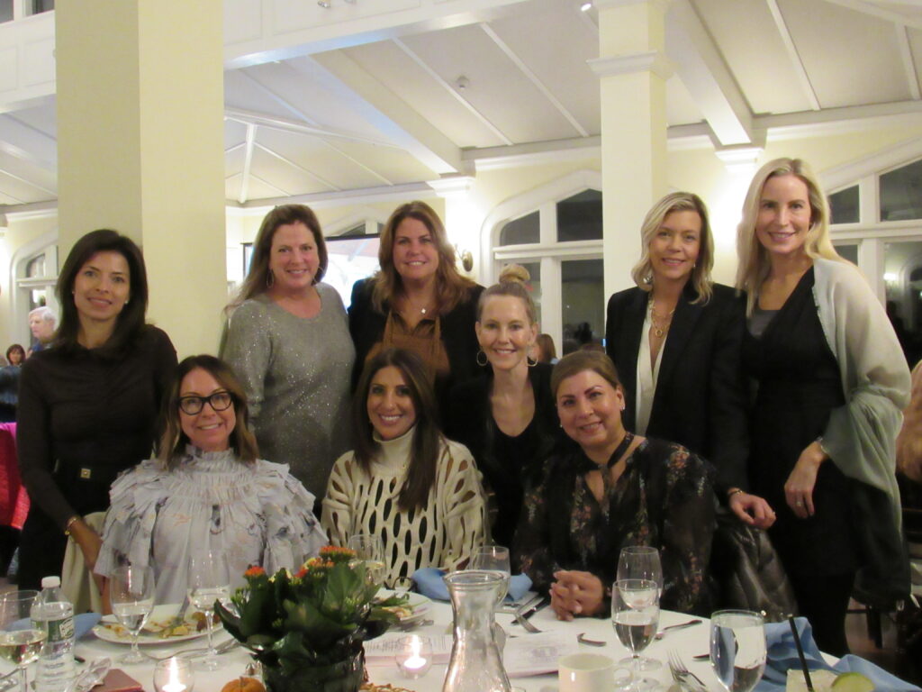 (PHOTO: Staci Ramachandran fans. Standing, left to right: Michele Allison, Jenny Eckerson, Veronica Iuliano, Cassie Fenton, Kate Stempel. Sitting, left to right: Jenn Molloy, Helen Leisengang, Melissa Boisseau (half sitting/half standing), Saima Mohomedally.)