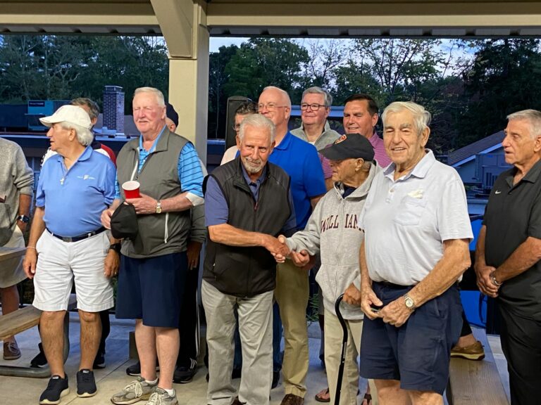 (PHOTO: Veterans leading the Pledge of Allegiance at the 32nd Annual George J. Kirby Memorial Golf Tournament. Left to right: Charlie Rosabella, Ron March,Tom Bassita, Bob Cypher (rear), Jim Dianni (rear), Terry McCartney (rear) Vinnie Ballantoni, Frank Berte, Dino Garr.)