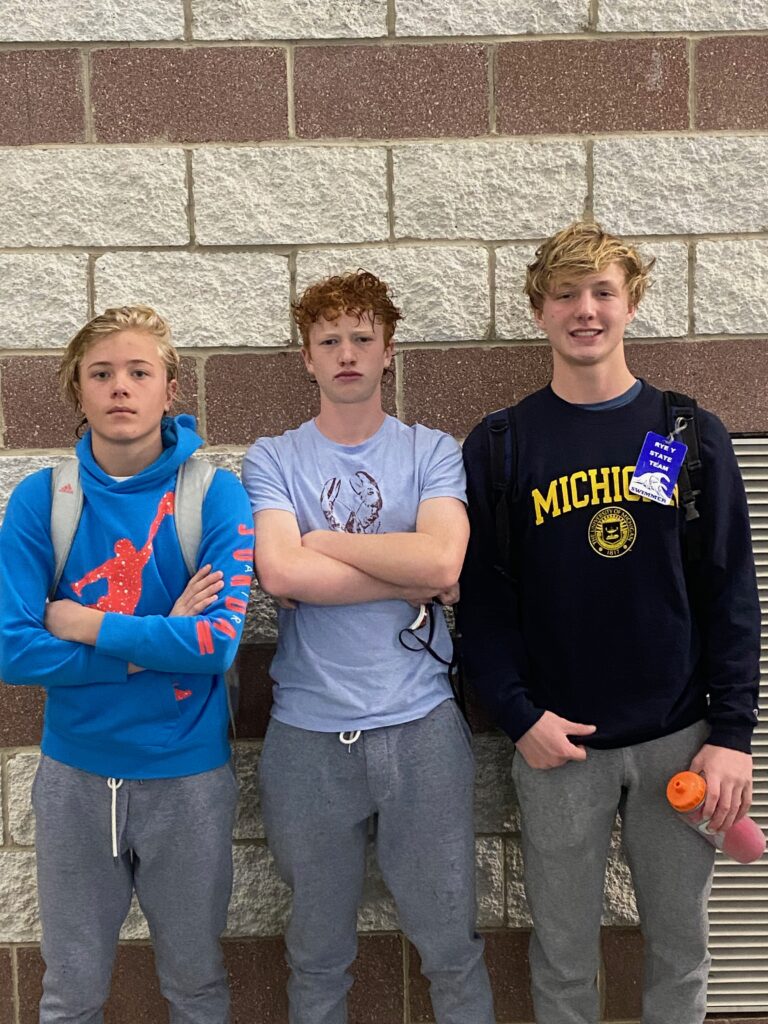 (PHOTO: Rye Boys Varsity Swimming & Diving swimmers after their first meet. Left to right: Filip Glitterstam, Wison Redd and Tripp Redd.)