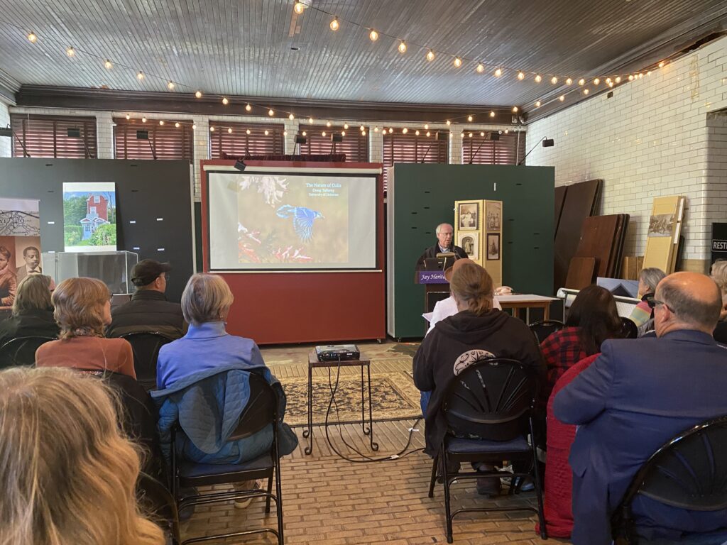 (PHOTO: Noted entomologist Doug Tallamy spoke at the Jay Heritage Center 's Carriage House during the JHC Sustainability Summit on October 29, 2022.)