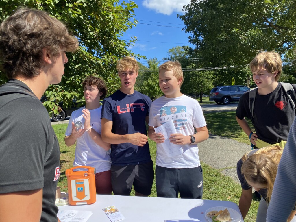 (PHOTO: Talking up the Bridges Club at the Rye High School club fair.)