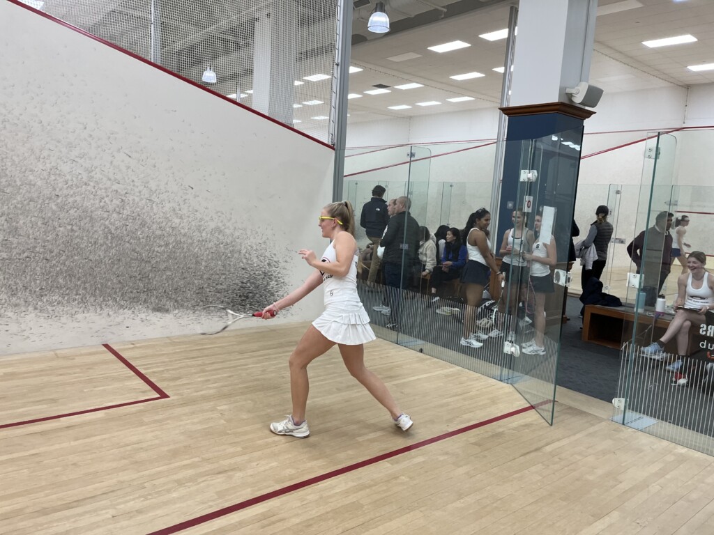 (PHOTO: Rye Girls Varsity Squash junior Paige Vanneck warms up for her match at Chelsea Piers. Paige went in to win in straight games 3-0.)