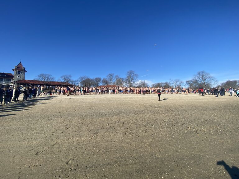 (PHOTO: The 21st Annual Polar Bear Plunge was held on January 1st, 2023 in Rye Town Park and honored Norbert Galligan.)