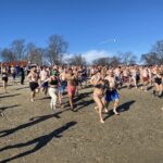 (PHOTO: The 21st Annual Polar Bear Plunge was held on January 1st, 2023 in Rye Town Park and honored Norbert Galligan.)