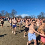 (PHOTO: The 21st Annual Polar Bear Plunge was held on January 1st, 2023 in Rye Town Park and honored Norbert Galligan.)