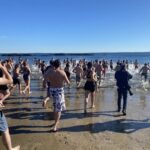 (PHOTO: The 21st Annua(PHOTO: The 21st Annual Polar Bear Plunge was held on January 1st, 2023 in Rye Town Park and honored Norbert Galligan.)l Polar Bear Plunge was held on January 1st, 2023 in Rye Town Park and honored Norbert Galligan.)