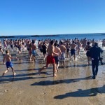 (PHOTO: The 21st Annual Polar Bear Plunge was held on January 1st, 2023 in Rye Town Park and honored Norbert Galligan.)