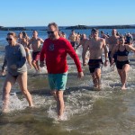 (PHOTO: The 21st Annual Polar Bear Plunge was held on January 1st, 2023 in Rye Town Park and honored Norbert Galligan.)