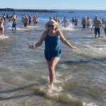 (PHOTO: The 21st Annual Polar Bear Plunge was held on January 1st, 2023 in Rye Town Park and honored Norbert Galligan.)