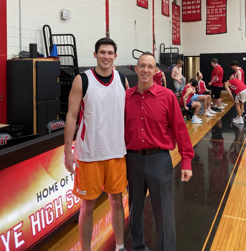 (PHOTO: Rye High Varsity Basketball alumni game MVP on Saturday was Mark Croughan, shown here with Boys Varsity Basketball Coach John Aguilar.) 2023-01-07