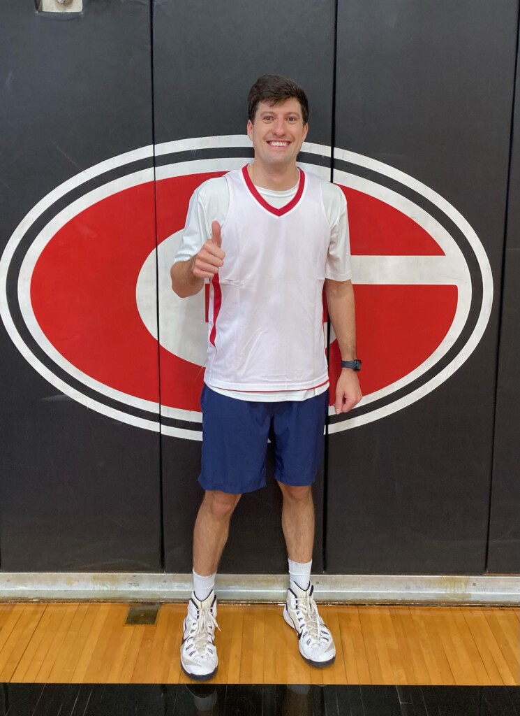 (PHOTO: Rye High Varsity Basketball Alum Drew Abate, Rye’s single season leader in charges taken took the first ever charge in alumni game history on Saturday.) 2022-01-07