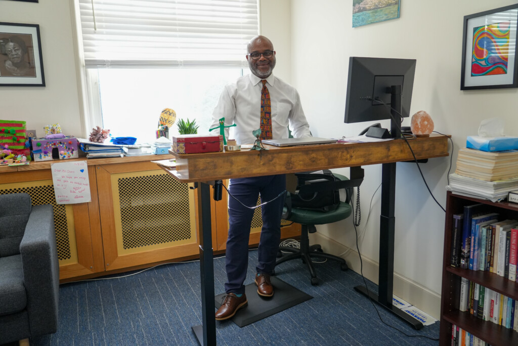 (PHOTO: Rye Country Day School’s Head of School Randall Dunn at his stand up desk.) 2023-03