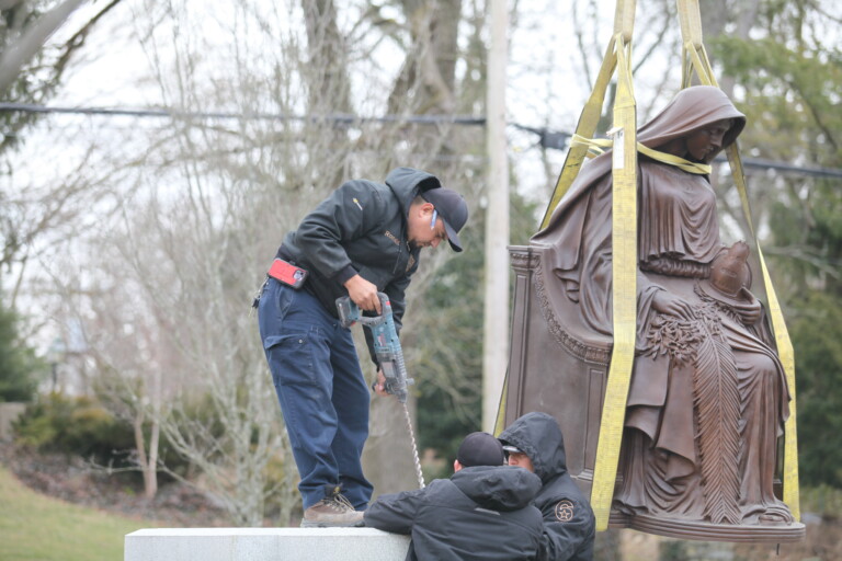 (PHOTO: Rye FD's memorial for fallen firefighters, Our Lady Memory, was reinstalled on Friday, March 10, 2023 after extensive renovation.)