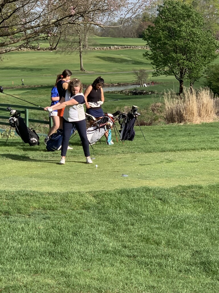 (PHOTO: Rye Girls Varsity Golf Bit the Harrison Huskies on Monday. Here is Myla Bisceglia teeing off hole 8 at Harrison Meadows.)