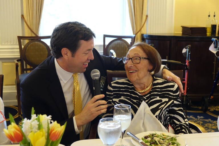 (PHOTO: At The Osborn's 2023 Centenarian Luncheon, Ann Unger, age 100, told the story of fleeing Nazi Germany and coming to the United States.)