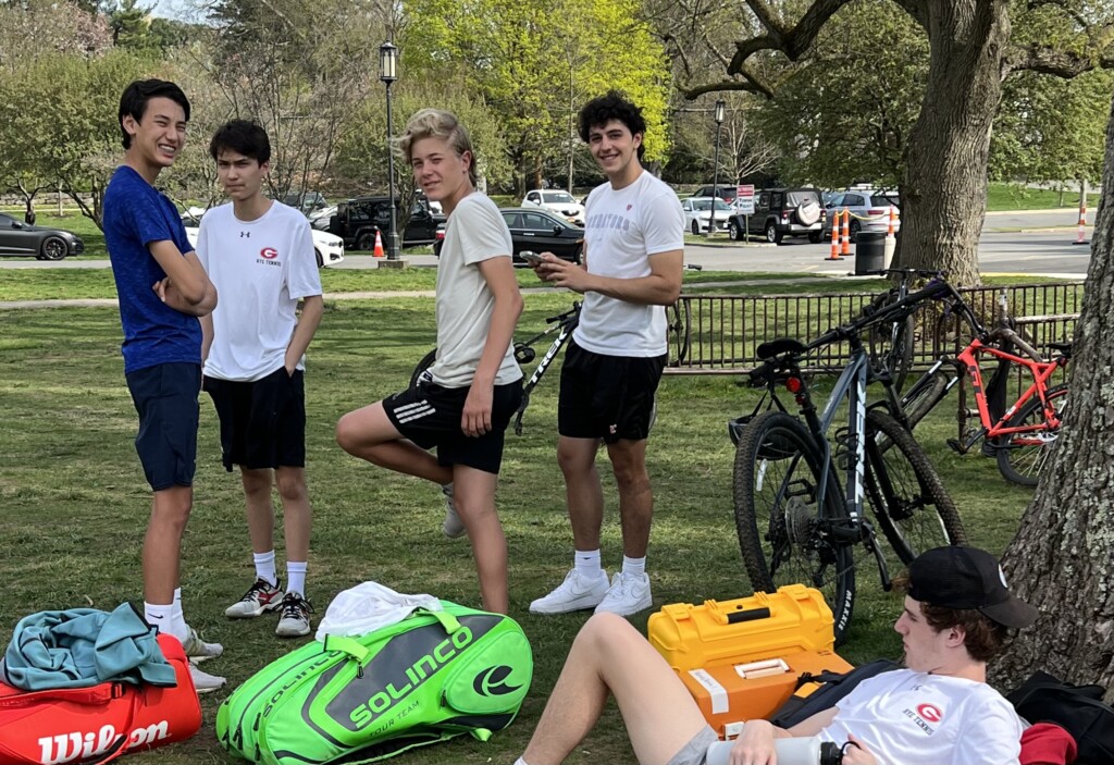 (PHOTO: Rye Boys Varsity Tennis players waiting for the late bus for Friday's match versus the Eastchester Eagles.)