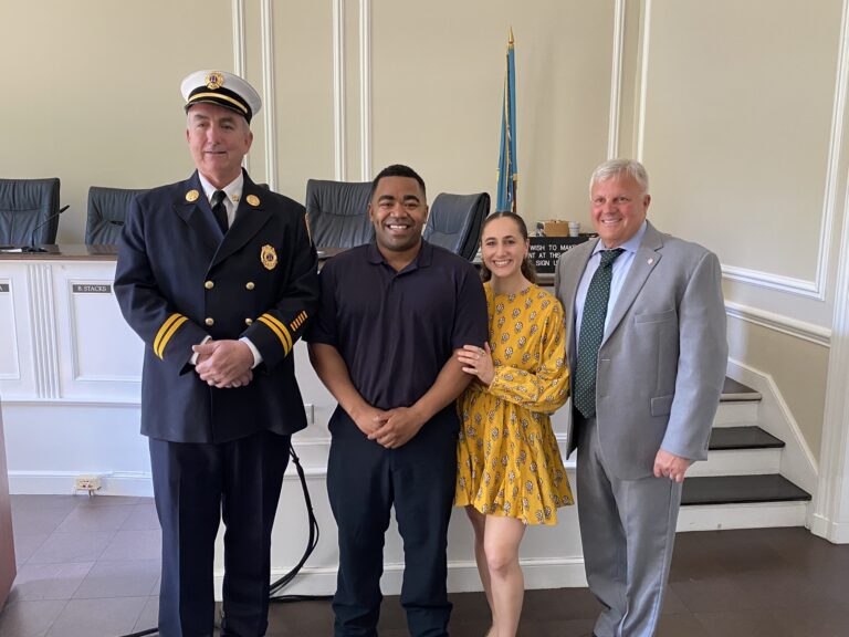 (PHOTO: The City of Rye Fire Department welcomed its newest firefighter Andre Wolfe on Monday, May 8, 2023 at City Hall. Left to right: Captain John McDwyer, Firefighter Andre Wolfe, Wolfe's partner Kayla Isaacs, and Public Safety Commissioner Mike Kopy.)