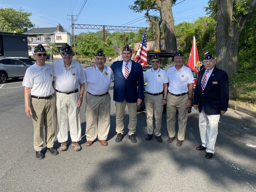 (PHOTO: Members of American Legion Post 128 moments before the start of the 2023 Memorial Day Parade down Purchase Street in Rye.)