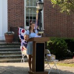 (PHOTO: Karenna Chader read her winning Memorial Day essay at the 2023 Memorial Day ceremony on the Rye Village Green.)