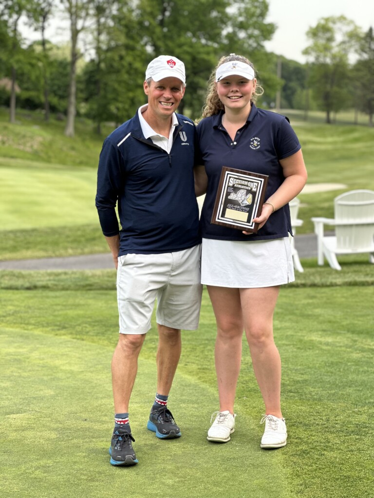 (PHOTO: Rye Girls Varsity Golf Coach Rich Savage with All-Section player Myla Bisceglia.)