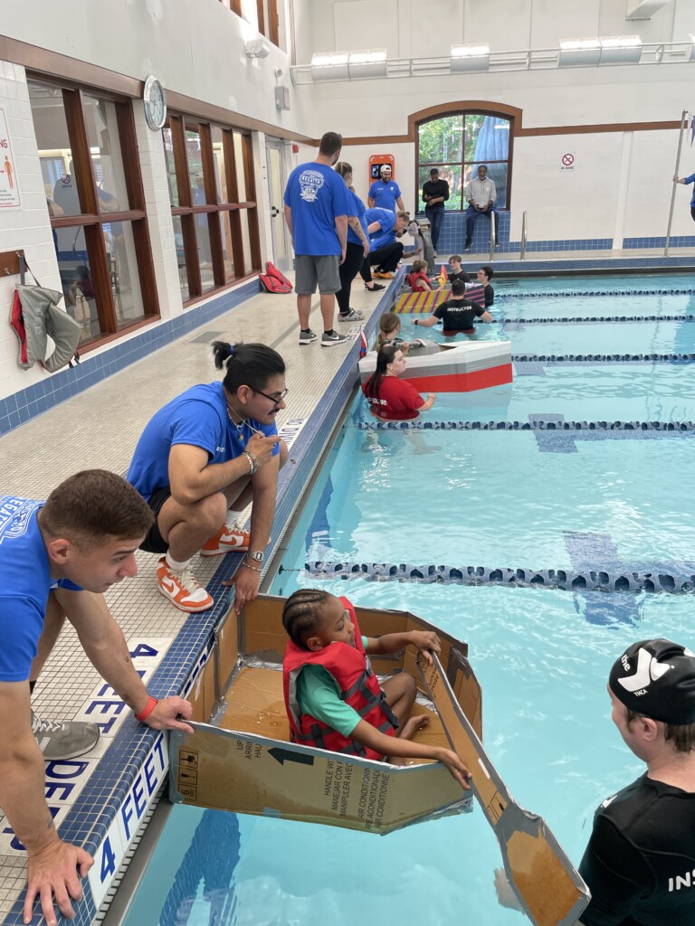 (PHOTO: The 7th Annual Rye YMCA Cardboard Boat Regatta - very tense at the starting line.)