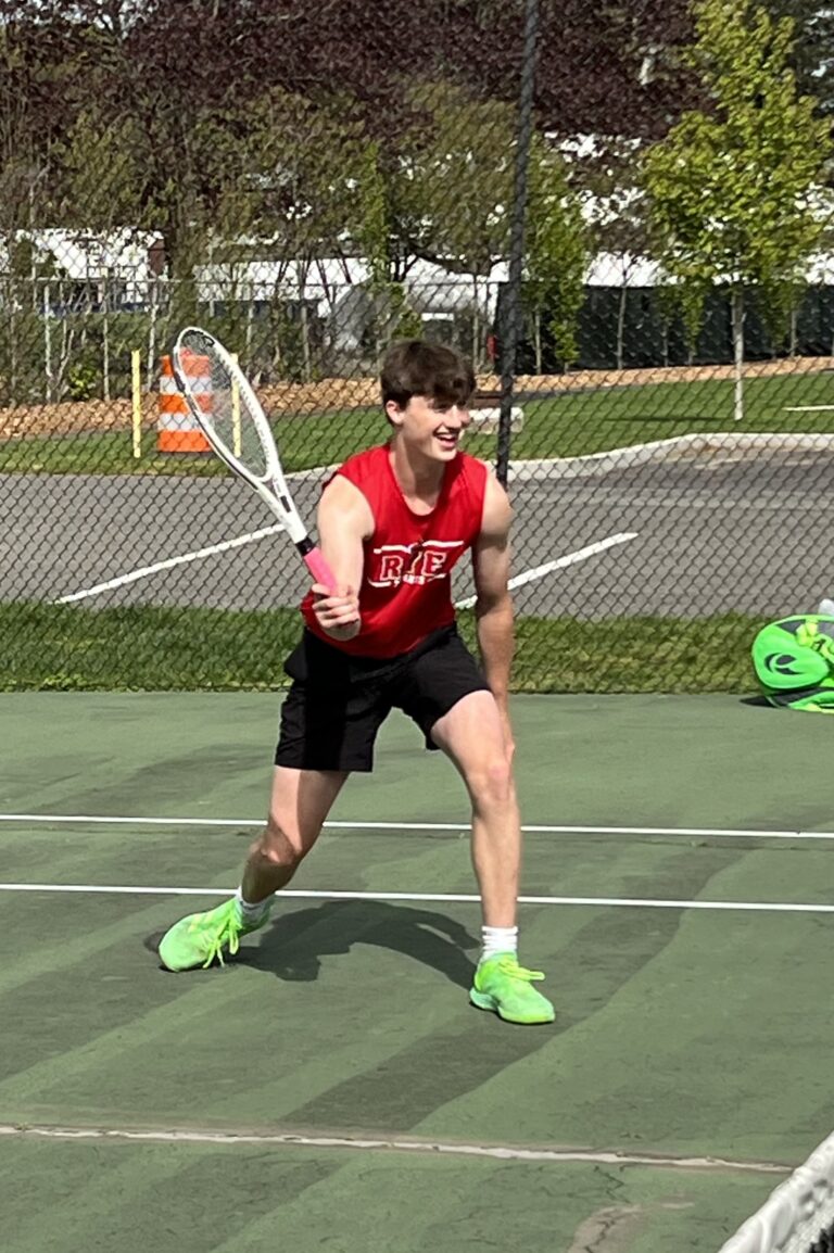 (PHOTO: 2023 Rye Boys Varsity Tennis Captain Henry Paul ready for a volley.)