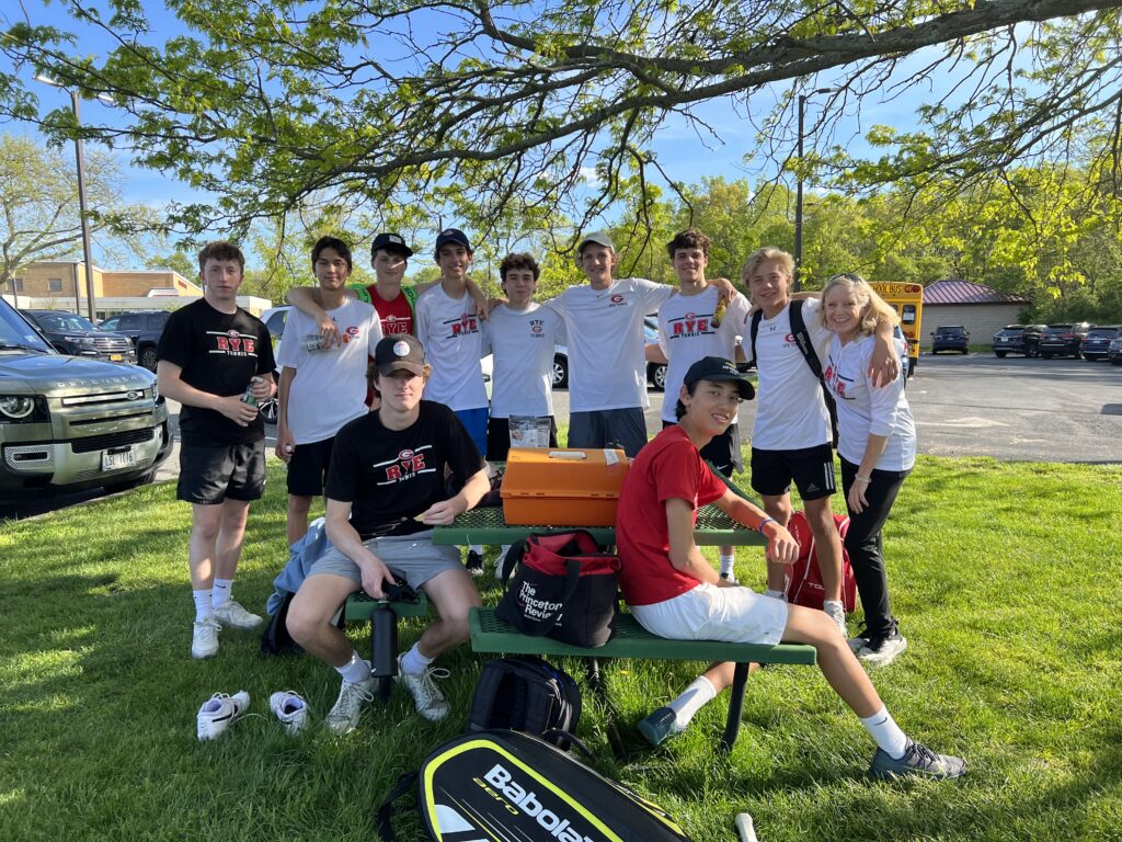 (PHOTO: The Rye Boys Varsity Tennis team on Monday in Harrison.  Happy team, happy coach! A beautiful May day.)