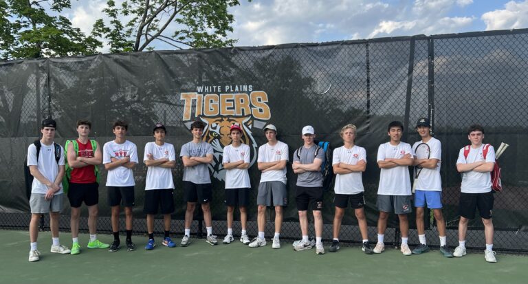 (PHOTO: Rye Boys Varsity Tennis victorious and happy on Thursday as the league champs.)