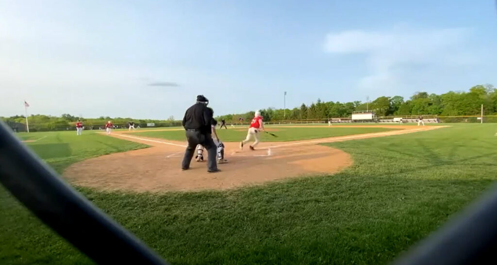 (PHOTO: Rye Boys Varsity Baseball player Julian Pasquale with a single go ahead RBI on Tuesday versus Harrison.)