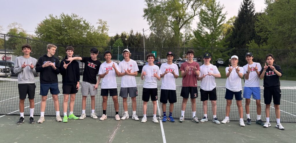 (PHOTO: Rye Boys Varsity Tennis sporting the W after the match versus Scarsdale B on Wednesday.)