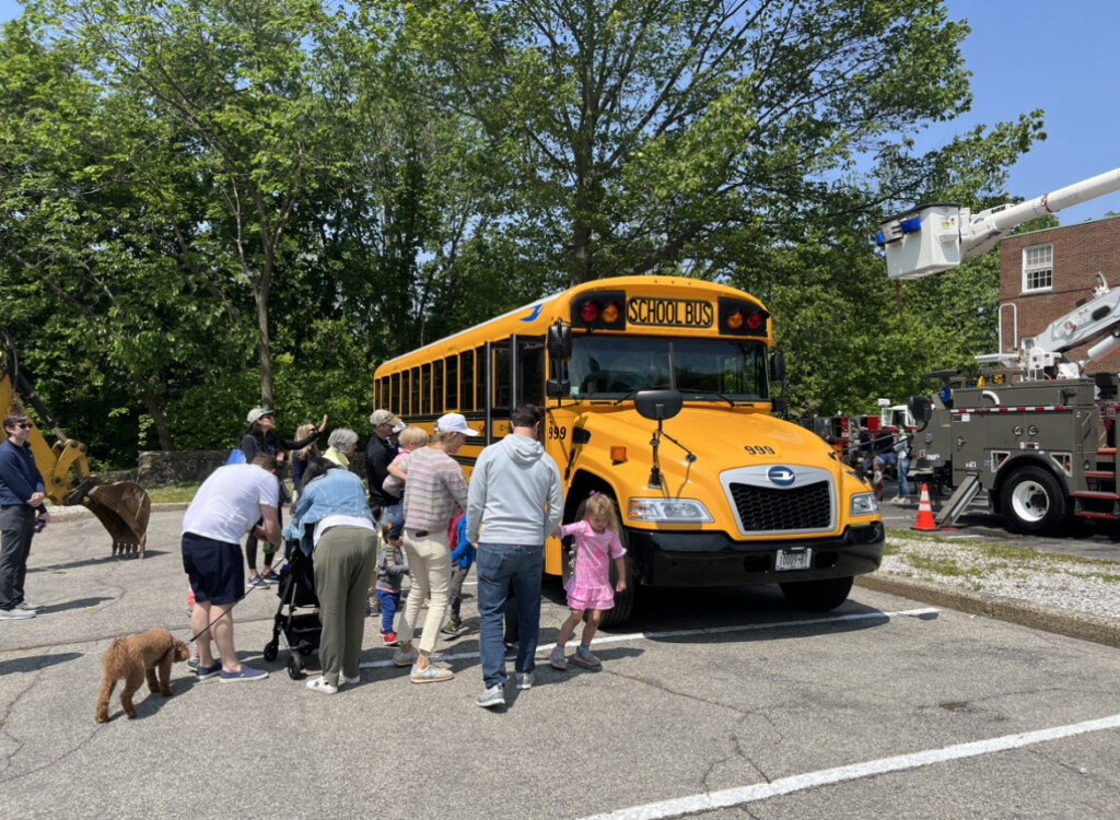 (PHOTO: The Rye Free Reading Room's 2023 annual Vehicle Fair: the Rye City School District does not offer busing - so this might have been a new experience for some students! Credit: Will McCullough.)