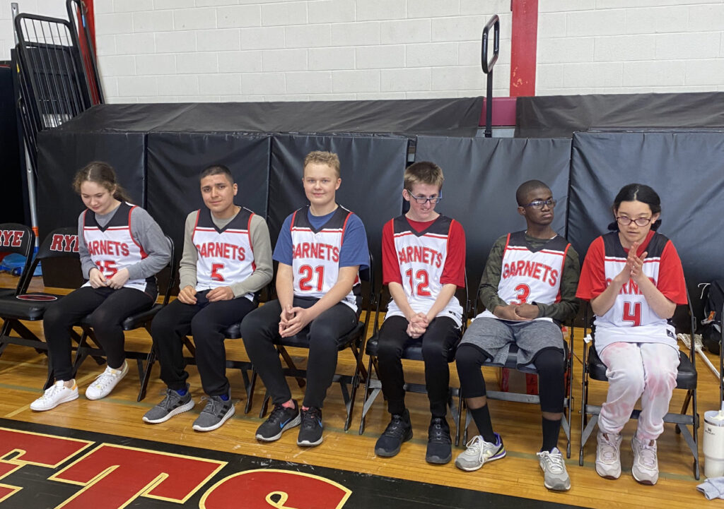 (PHOTO: Rye High School's Unified Basketball team on Monday as they faced the Mamaroneck Tigers.)