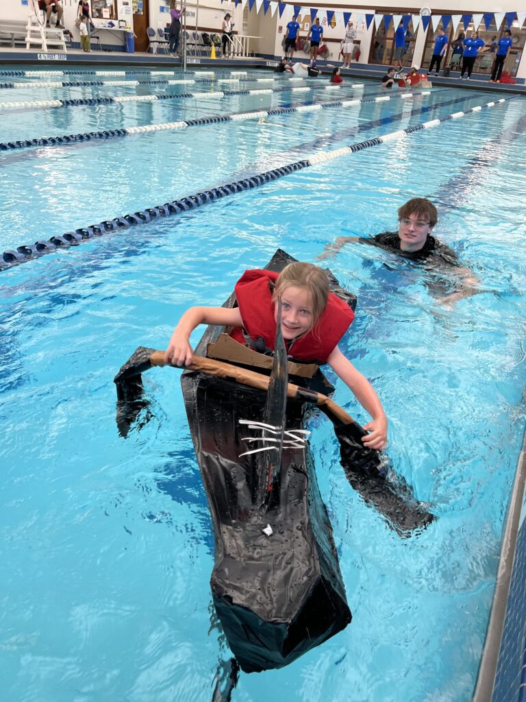 (PHOTO: The 7th Annual Rye YMCA Cardboard Boat Regatta - a slightly oar-iffic situation.)