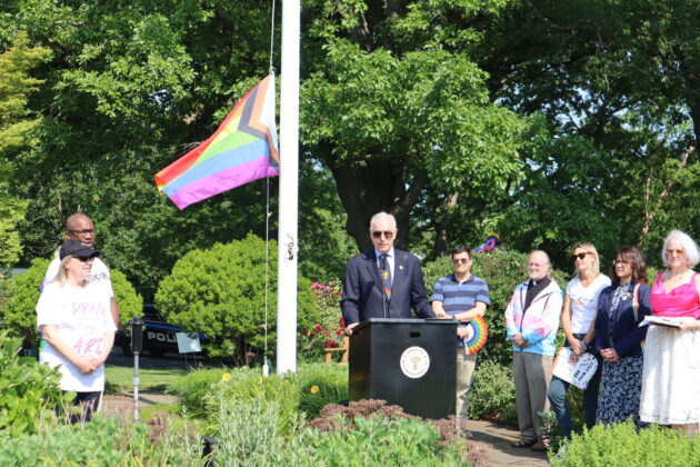 (PHOTO: Town of Rye Supervisor Gary Zuckerman speaks to the crowd at the Pride flag raising in Rye Town Park on Saturday, June 10, 2023. Credit: Sierra Desai.)