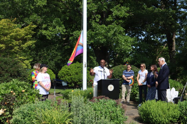 (PHOTO: Congressman Jamaal Bowman shares a few words of inspiration at the Pride flag raising in Rye Town Park on Saturday, June 10, 2023. Credit: Sierra Desai.)