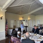 (PHOTO: Rye City Schools Director of Athletics Susan Reid Dullea offered remarks before the student-athletes were recognized.)